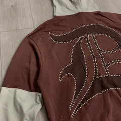 DUAA Hoodie Trendy patchwork French terry sweatshirt featuring distressed details and rhinestone embellishments.