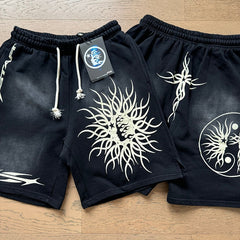 Hellstar shorts Casual style with a washed, distressed, and splatter-paint finish