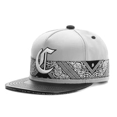Trendy flat brimmed snapback hatscashew pattern printing embroider leather hat