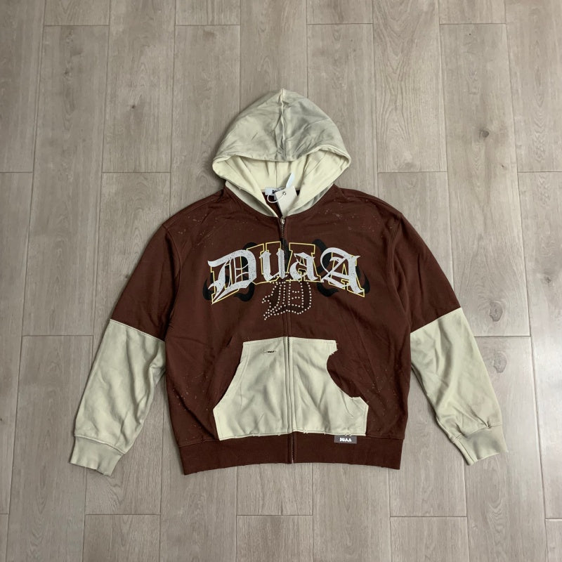 DUAA Hoodie Trendy patchwork French terry sweatshirt featuring distressed details and rhinestone embellishments.