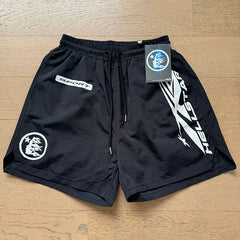 Hellstar shorts Casual style with a washed, distressed, and splatter-paint finish