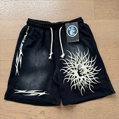 Hellstar shorts Casual style with a washed, distressed, and splatter-paint finish